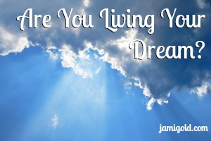 Sunrays emerging from cloud with text: Are You Living Your Dream?